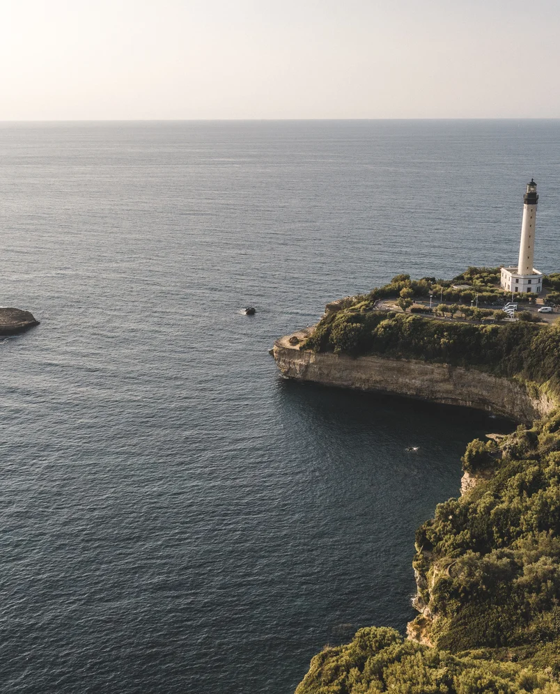 Spectacular panoramic view of the ocean and the Biarritz Lighthouse near the Le Garage hotel.