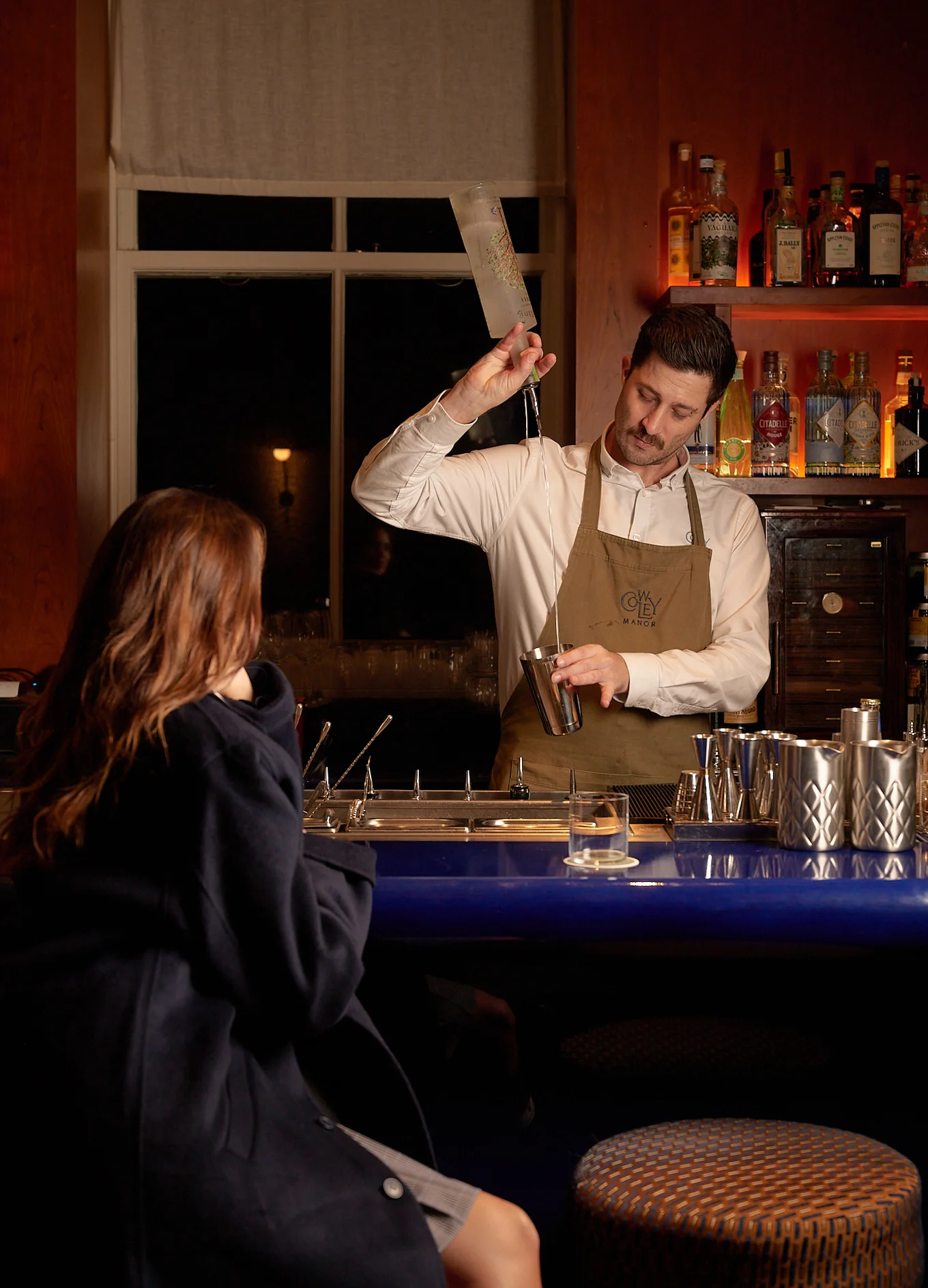 A refreshing signature long drink served in a crystal glass at the Experimental Chalet bar in Verbier.