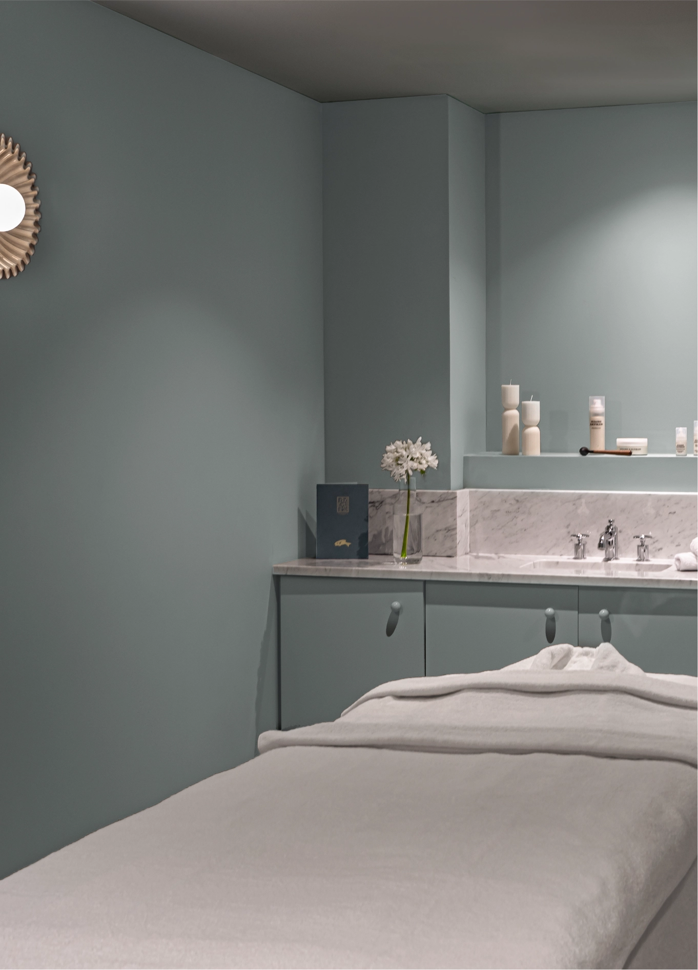 Minimalist and soothing interior design of the wellness area at the Regina Experimental hotel.
