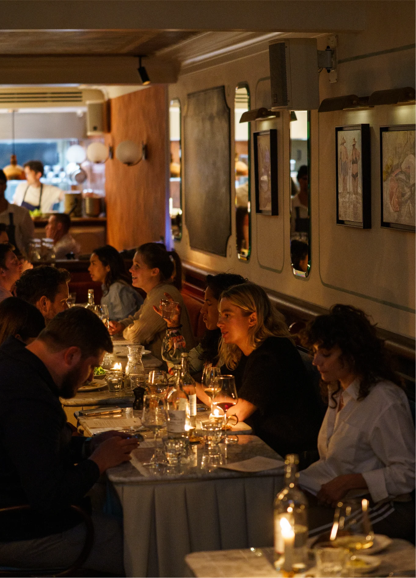 Lively dining room with guests at Henri upscale restaurant, Henrietta Hotel, Covent Garden, London