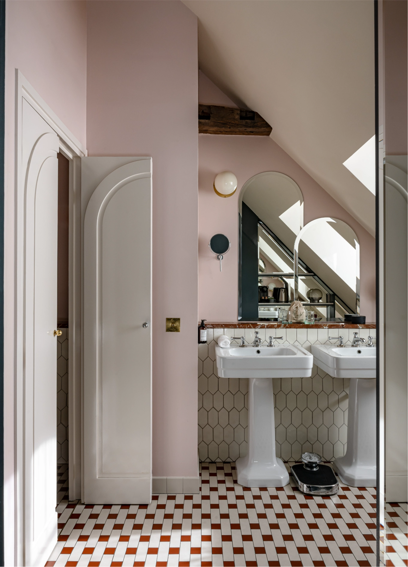 Attic bathroom with pedestal sinks and mosaic tiles at Grands Boulevards Experimental, Paris 2