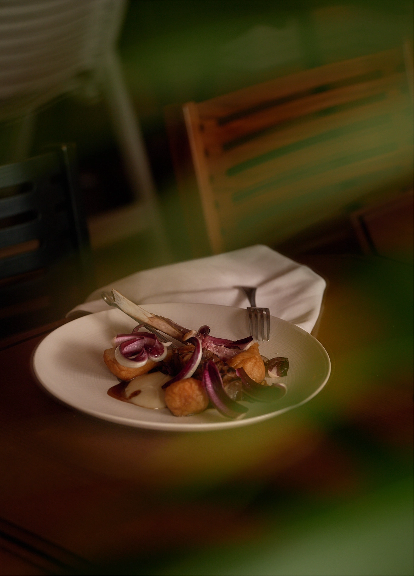 Gourmet dish with colourful vegetables being plated at Restaurant des Grands Boulevards, Paris 2