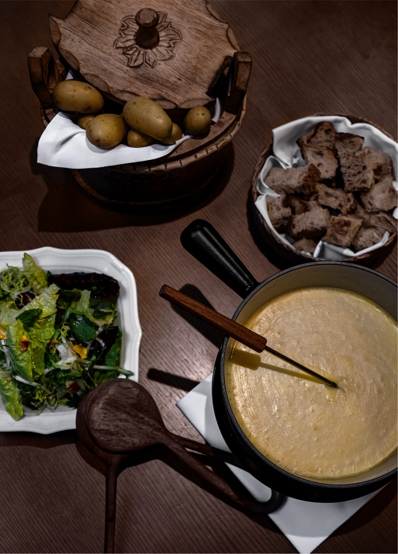 Traditional mountain fondue and dishes at L'Aiglon fine dining restaurant, Val d'Isère, French Alps