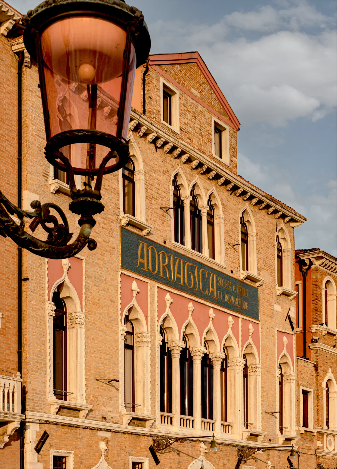 Venetian palazzo exterior facade with street lantern, Il Palazzo Experimental, Venice