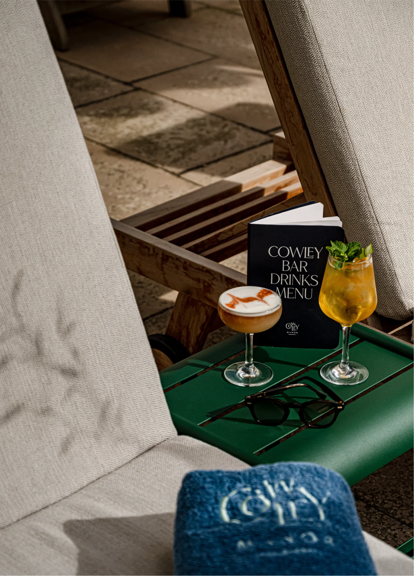 Cocktails and drinks served at the pool bar, Cowley Manor Cotswolds