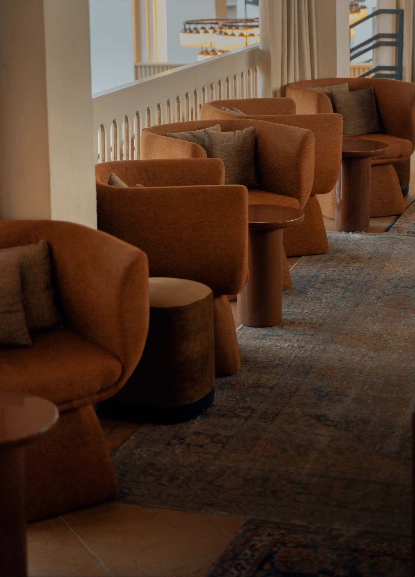 Lounge with brown leather sofas and dim lighting at American Bar, Experimental Marais, Paris
