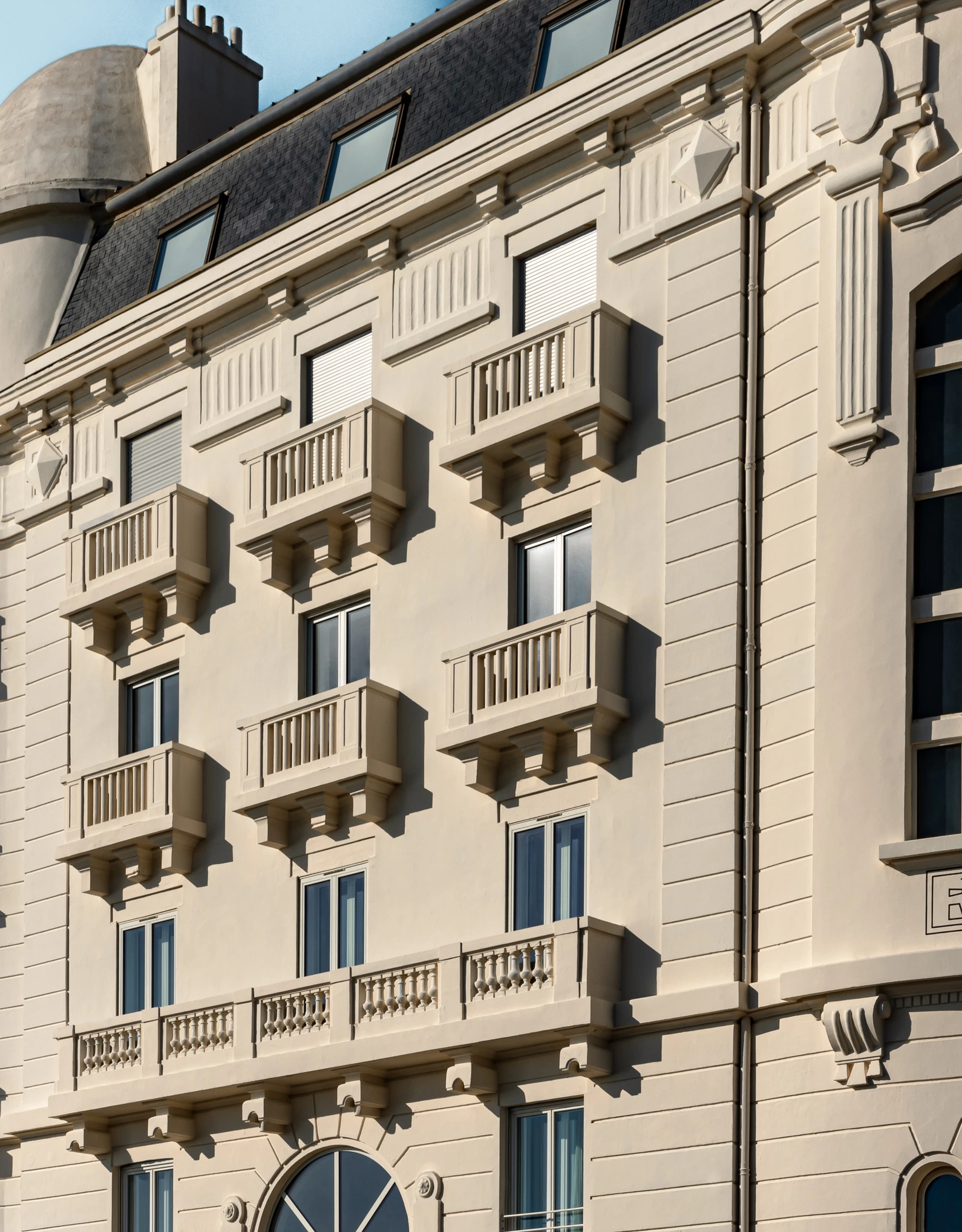 Exterior view of the hotel's elegant facade, a reflection of the contemporary luxury unique to the Experimental Group.