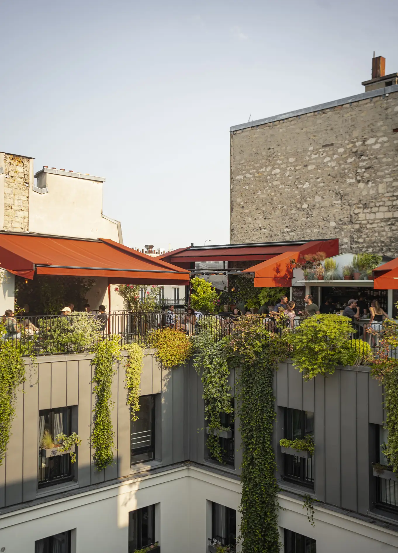 Rooftop terrace with Parisian rooftop view and greenery at The Shed, Grands Boulevards, Paris