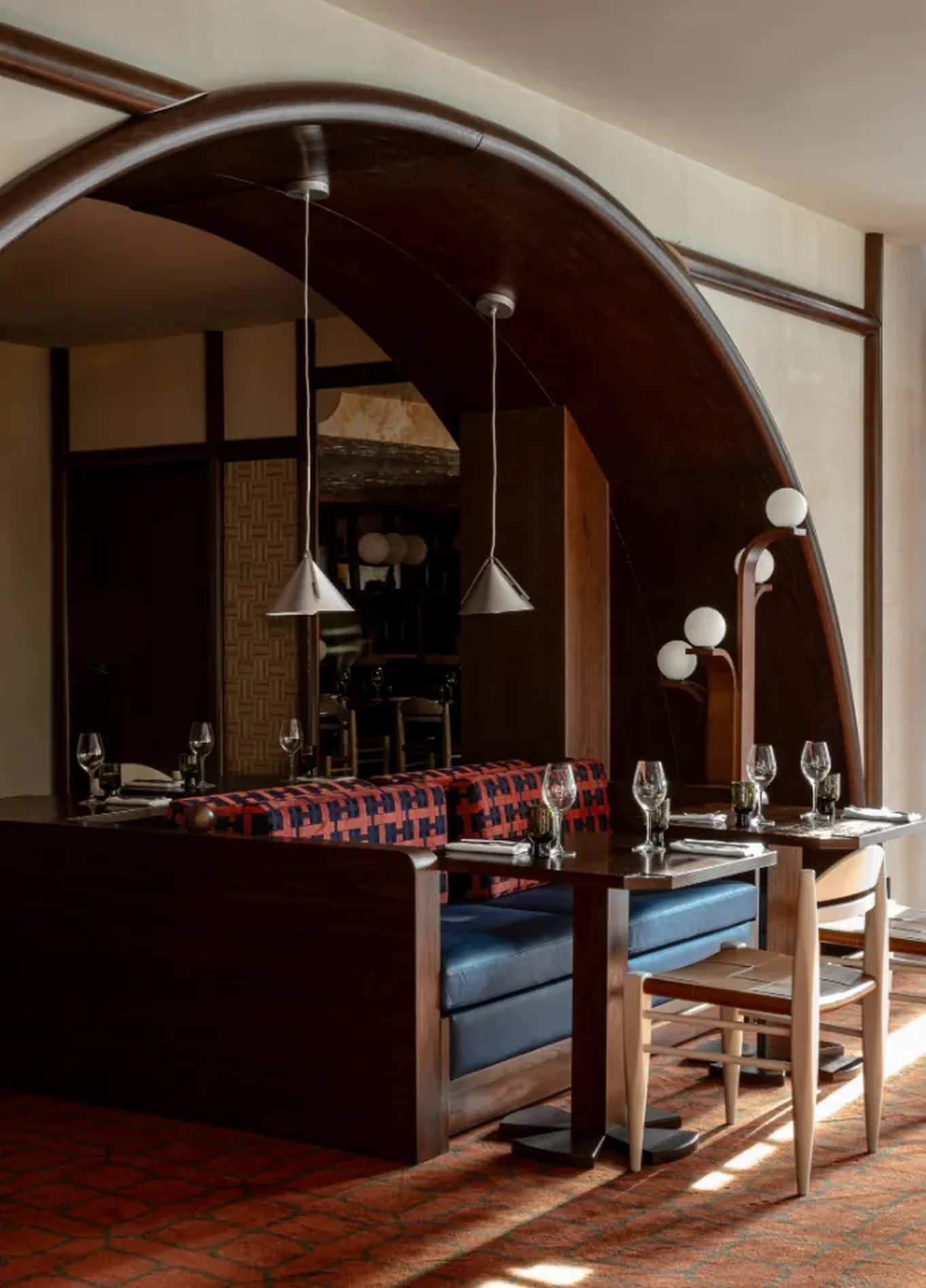 Warm arched dining room at L'Aigle d'Or restaurant, Experimental Chalet, Val d'Isère
